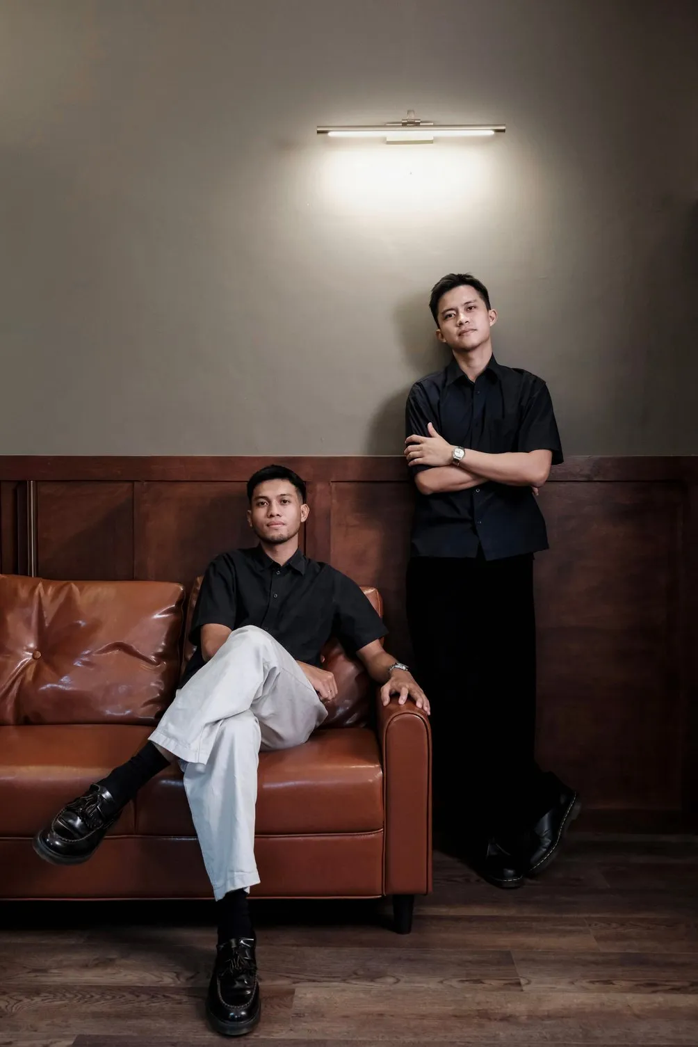 M Akbar Junaedi, seated on the left, and Ben Barukh Kurniawan, standing on the right